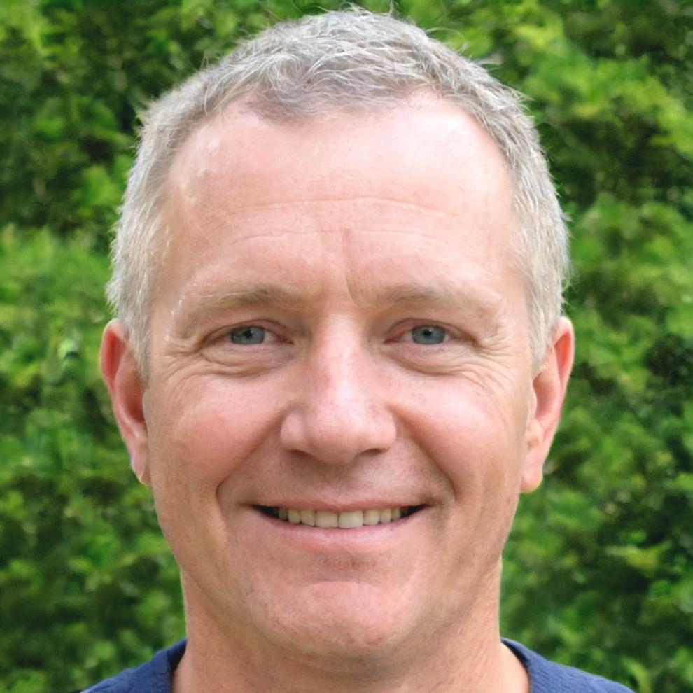 Professional headshot of Kieran Holbrook